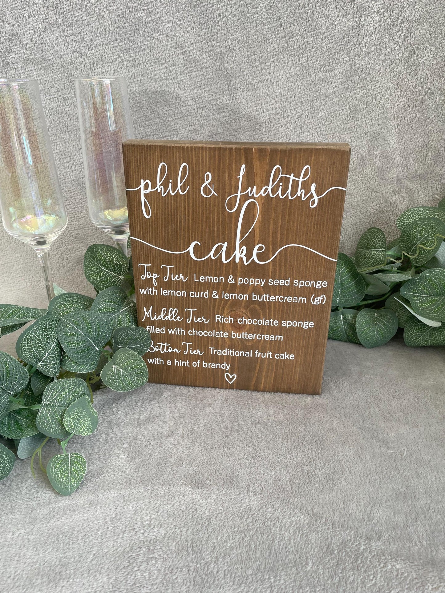 Wooden wedding cake menu, wedding reception table decor.