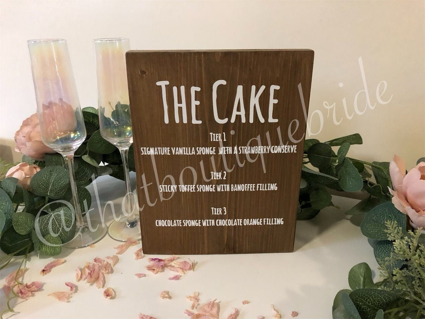 Wooden wedding cake menu, wedding reception table decor.