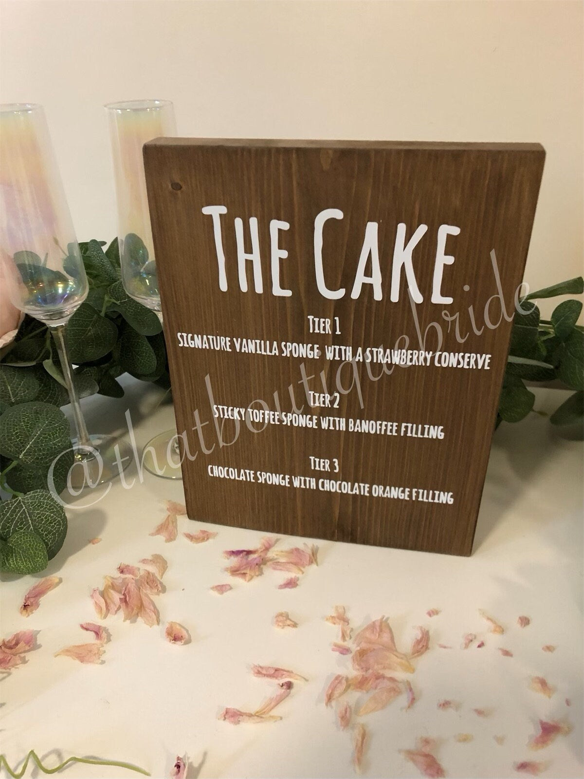 Wooden wedding cake menu, wedding reception table decor.