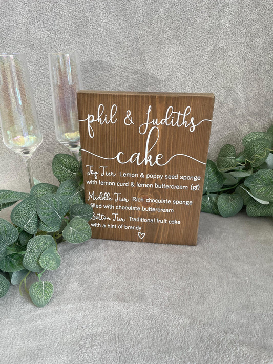 Wooden wedding cake menu, wedding reception table decor.